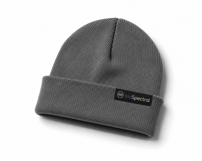 BioSpectral Signal Shield Beanie interior silver-fiber shielding lining detail, showing 100% silver shielding material and blocked signal types: cell towers, 4G/5G, WiFi, StarLink, Bluetooth